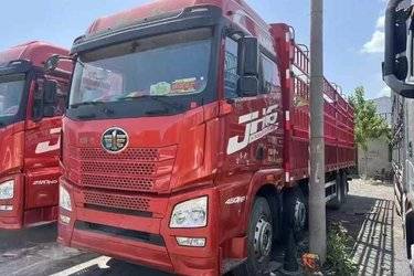 二手青岛解放 JH6重卡 领航版2.0 460马力 8X4 9.4米AMT自动挡仓栅式载货车(国六) 前四后八 潍柴二手载货车 黄牌图片