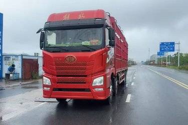 二手青岛解放 JH6重卡 460马力 8X4 9.4米仓栅式载货车(国五) 前四后八 潍柴二手载货车 黄牌图片