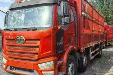 二手一汽解放 J6L 精英版 320马力 8X2 7.7米仓栅式载货车(国六) 前四后六 锡柴二手载货车 黄牌