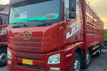 二手青岛解放 JH6重卡 460马力 8X4 9.4米仓栅式载货车(国五) 前四后八 锡柴二手载货车 黄牌图片