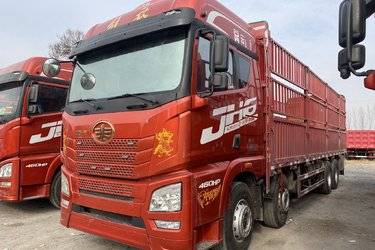 二手青岛解放 JH6重卡 460马力 8X4 9.5米仓栅式载货车(国五) 前四后八 锡柴二手载货车 黄牌