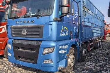 二手中国重汽 汕德卡SITRAK G7重卡 440马力 8X4 9.6米仓栅式载货车(国五) 前四后八 曼二手载货车 黄牌图片