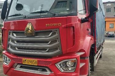 二手中国重汽 HOWO TX 270马力 4X2 5.8米仓栅式货车(国六) 单桥 中国重汽二手载货车 黄牌图片