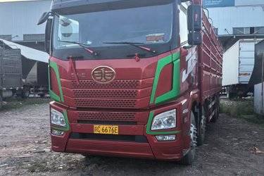 二手青岛解放 JH6重卡 领航版2.0 460马力 8X4 9.4米仓栅式载货车(国五) 前四后八 锡柴二手载货车 黄牌
