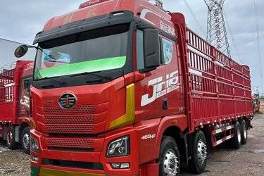 二手青岛解放 JH6重卡 460马力 8X4 9.4米仓栅式载货车(国五) 前四后八 锡柴二手载货车 黄牌图片