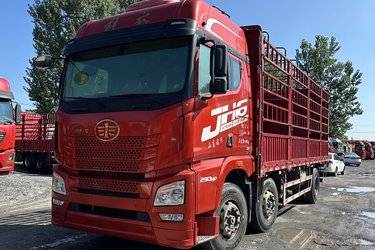 二手青岛解放 JH6重卡 领航版2.0北方款 290马力 6X2 7.7米仓栅式载货车(国六) 前四后四 锡柴二手载货车 黄牌