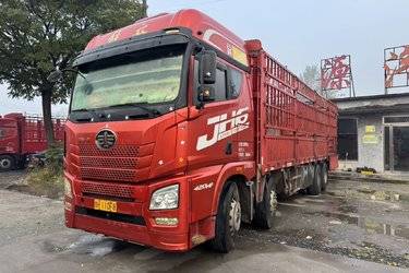二手青岛解放 JH6重卡 领航版2.0 420马力 8X4 9.5米仓栅式载货车(国五) 前四后八 锡柴二手载货车 黄牌