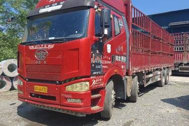 二手一汽解放 J6P重卡 标载型 350马力 8X4 9.5米仓栅式载货车(国五) 前四后八 锡柴二手载货车 黄牌图片