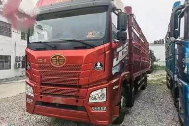 二手青岛解放 JH6重卡 420马力 8X4 9.4米仓栅式载货车(国五) 前四后八 锡柴二手载货车 黄牌