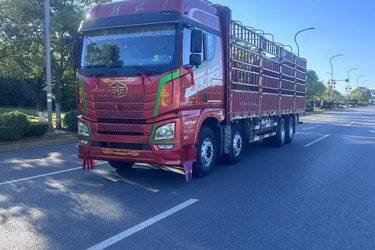 二手青岛解放 JH6重卡 350马力 8X4 9.4米仓栅式载货车(国五) 前四后八 锡柴二手载货车 黄牌