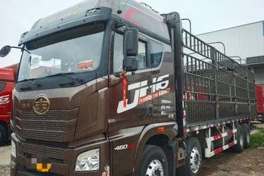 二手青岛解放 JH6重卡 领航版2.0 460马力 8X4 9.4米仓栅式载货车(国五) 前四后八 潍柴二手载货车 黄牌