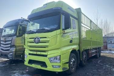 二手一汽解放 J7重卡 经典版 560马力 8X4 9.4米AMT自动档仓栅式载货车(带液缓)(国六) 前四后八 锡柴二手载货车 黄牌