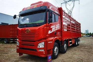 二手青岛解放 JH6重卡 460马力 8X4 9.4米仓栅式载货车(国五) 前四后八 锡柴二手载货车 黄牌图片