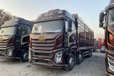 二手一汽解放 J6V 领航版 580马力 8X4 9.5米仓栅式载货车(国六) 前四后八 锡柴二手载货车 黄牌