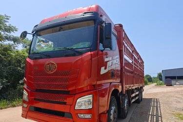 二手青岛解放 JH6重卡 460马力 8X4 9.4米仓栅式载货车(国五) 前四后八 潍柴二手载货车 黄牌