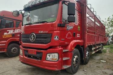 二手陕汽重卡 德龙新M3000 轻量化版 300马力 6X2 9.55米仓栅式载货车(玉柴)(国五) 前四后四 潍柴二手载货车 黄牌图片
