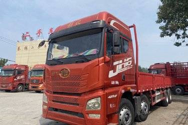 二手青岛解放 JH6重卡 420马力 8X4 9.5米栏板载货车(速比4.1)(国五) 前四后八 锡柴二手载货车 黄牌图片